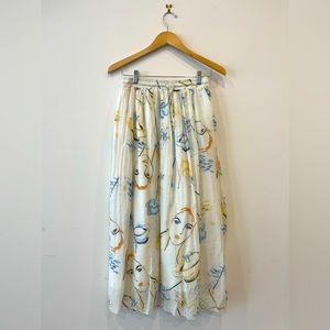 Light and airy cotton maxi skirt with drawstring at waist.
